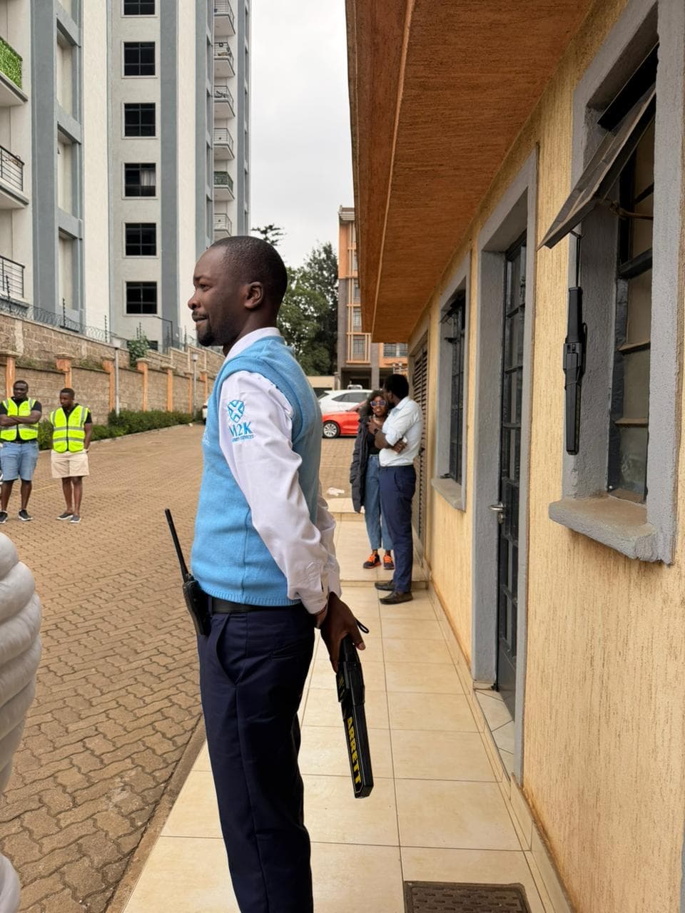 M2K guard on patrol beside apartment blocks